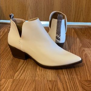 White booties with snakeskin strip